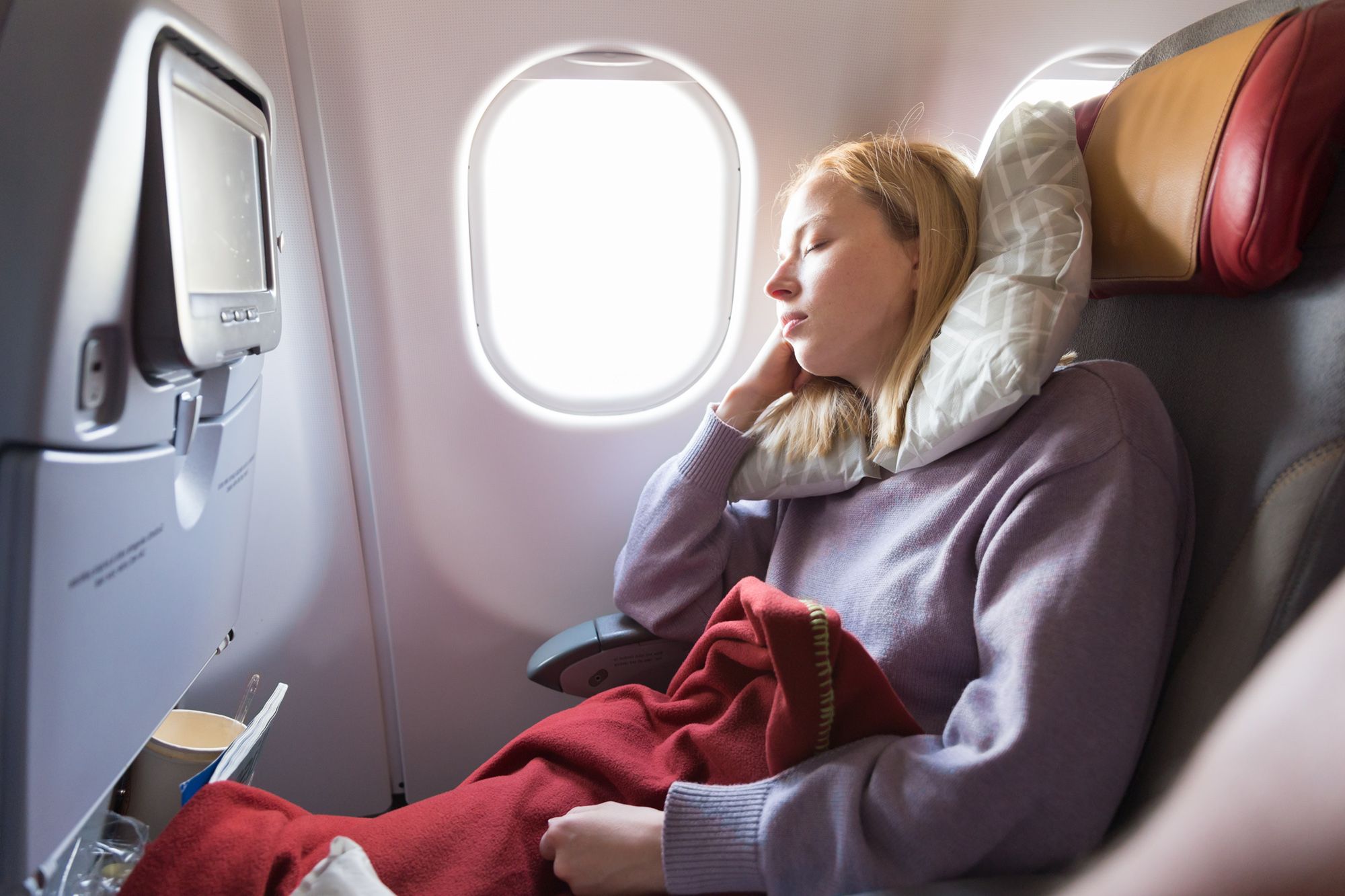 How to Successfully Sleep on a Plane