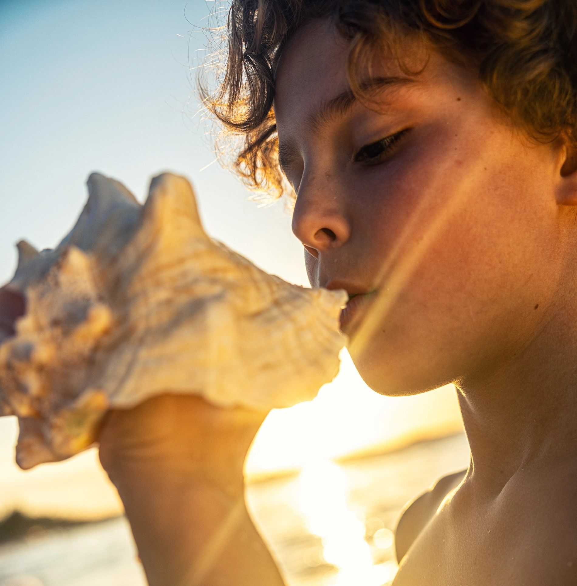 Boy with conch shell