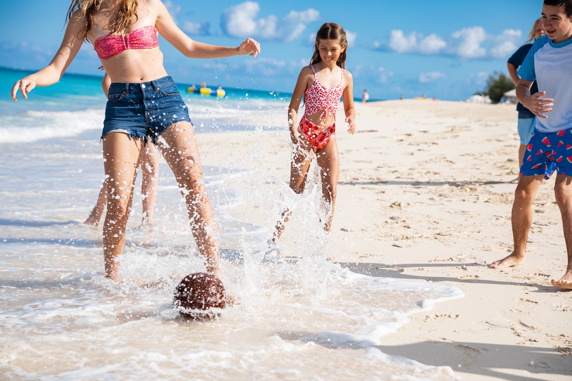 Kids playing on Turks & Caicos beach