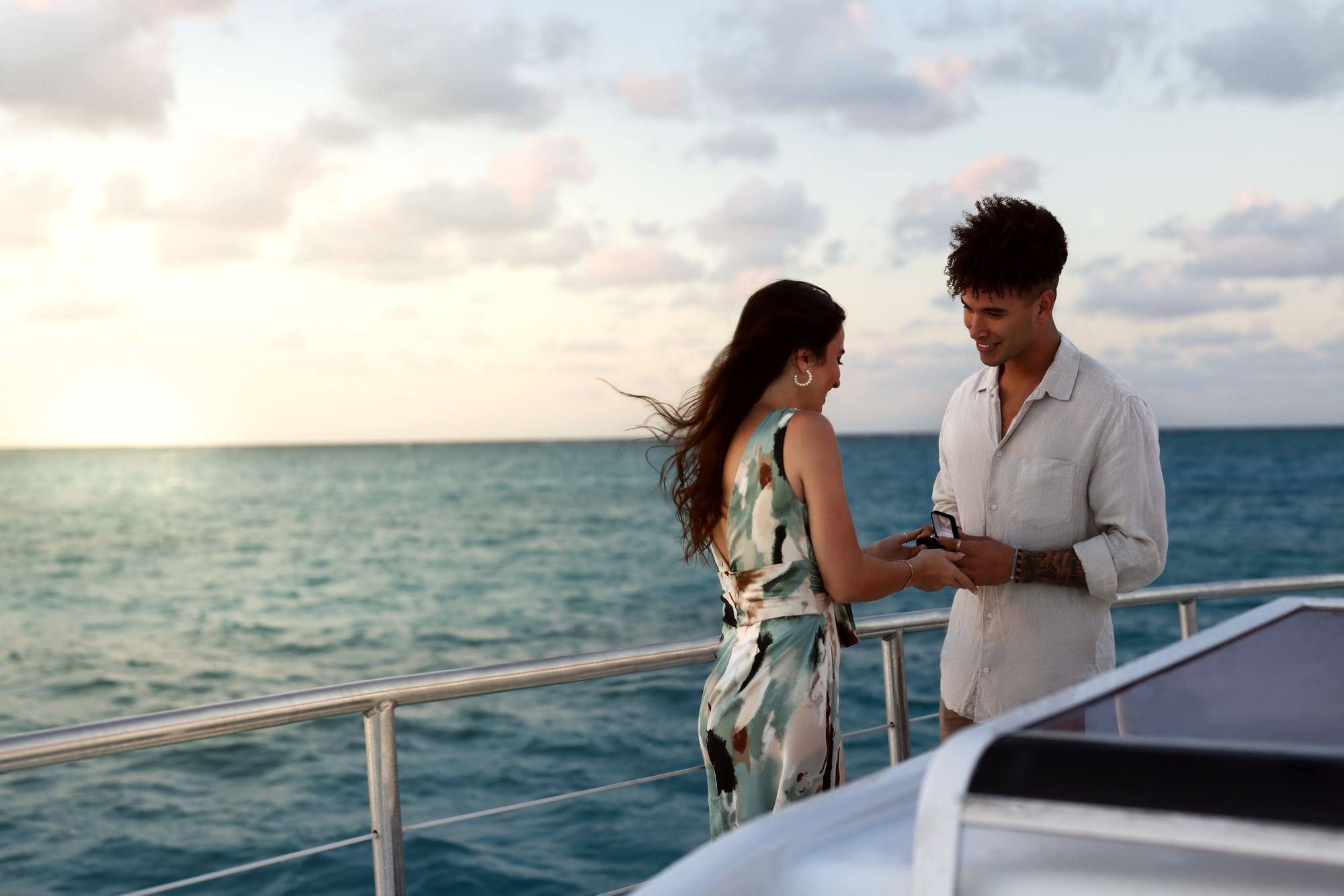 couple proposal on boat